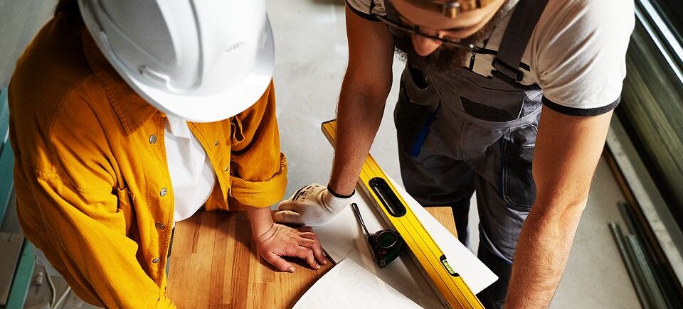 Two people are working on a project together.