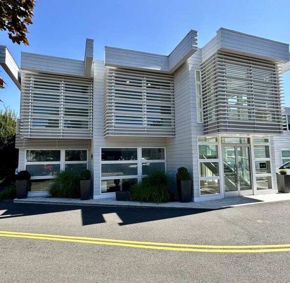 A large building with many windows on the outside.