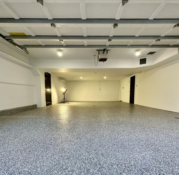 A garage with a lot of white walls and ceiling